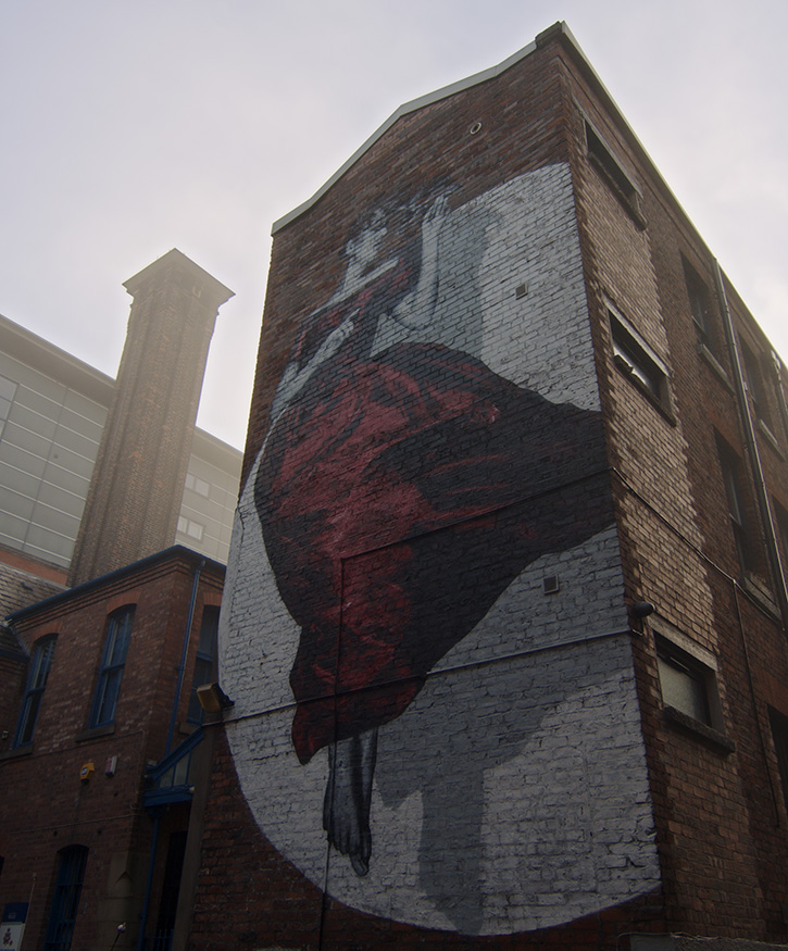 A photo taking in the northern quarter of some grafiti. Morning sunrise